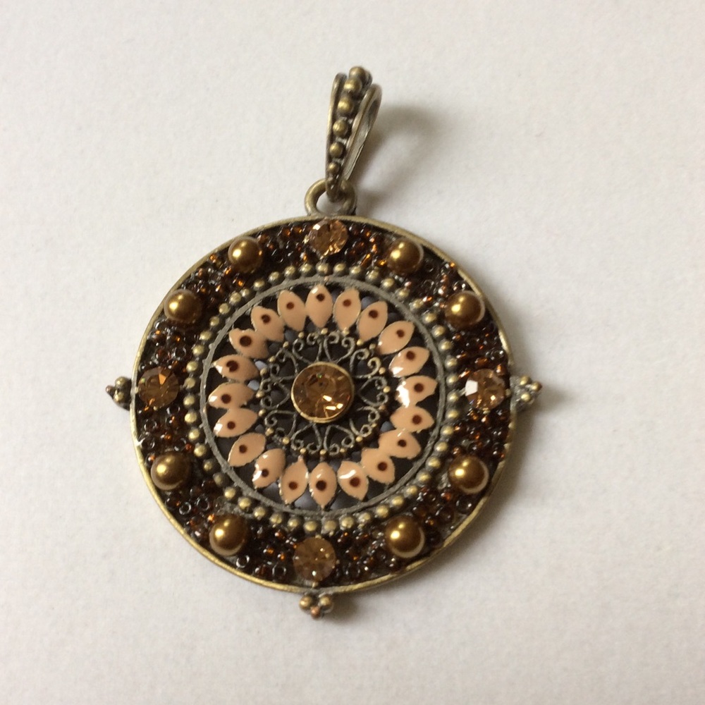 Amber colored Rhinestone pendant. Beautiful piece.